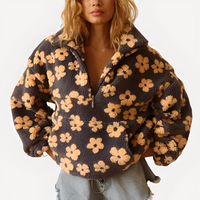 Elizabeth - Stylischer Pullover mit Blumendekoration in Gelb