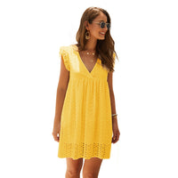 Karen – Sommerkleid mit V-Ausschnitt aus Baumwolle und kurzem Rock in einheitlicher Farbe in Gelb
