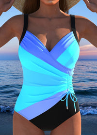 Eleganter Surplice-Badeanzug mit auffälligem buntem Druck in Blau