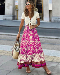 Katie – Lange Schwingröcke mit geometrischem Muster in Rosa