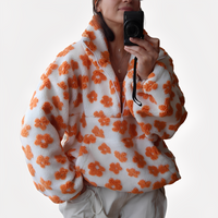 Elizabeth - Stylischer Pullover mit Blumendekoration in Orange