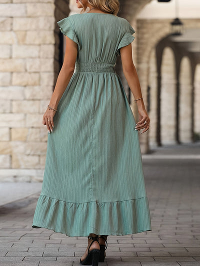 Resti | Elegantes einfarbiges Kleid mit Rundhalsausschnitt und Rüschen