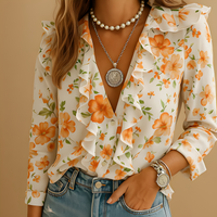 Aleida - Elegante Damenbluse mit langen Ärmeln und Details in Orange