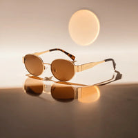 Nomi | Unisex Sonnenbrille Viral Trend Statement UV-Schutz Modern in Bronze/Gold