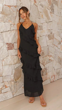 Patricia - Maxikleid mit Halterhals und gestuften Rüschen und offenem Rücken in Schwarz