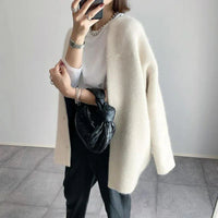 Miline - Lässige Strickjacke mit langen Ärmeln in Cremeweiß