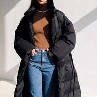 Damen Longline-Parka mit Wickelgürtel und voluminösen Ärmeln in Schwarz