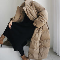 Damen Maxi-Steppmantel mit hohem Stehkragen und winddichter Wattierung in Khaki