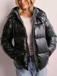 Damen Steppjacke mit verstellbarer Kapuze und Reißverschlusstaschen in Schwarz