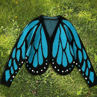 Cardigan Farfallia™ aus strukturiertem Strick mit Schmetterlingsflügel-inspiriertem Design in Blau