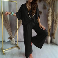 Biarritz™ Set — V-Ausschnitt-Bluse & Palazzo-Hose mit verstellbarem Kordelzugbund in Schwarz