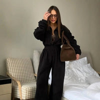 Vancouver™ Sweat-Jumpsuit mit Stehkragen und definierter Taille in Schwarz