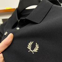 Calvin | Herren dehnbares elegantes Poloshirt in Schwarz