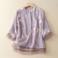 Damen Bluse mit Knopfleiste, Rundhalsausschnitt und floraler Struktur in Lila