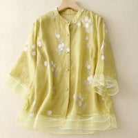 Damen Bluse mit Knopfleiste, Rundhalsausschnitt und floraler Struktur in Gelb