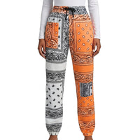 Damen-Jogginghose mit Paisley-Muster in Orange