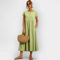 Damen-Midikleid mit kurzen Ärmeln und Seitentaschen in Hellgrün