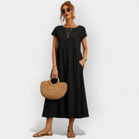 Damen-Midikleid mit kurzen Ärmeln und Seitentaschen in Schwarz