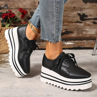 Frieda | Damen Plateau Sneaker mit Schnürung in Schwarz