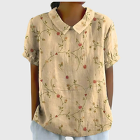 Kurzärmelige Damenbluse mit Blumenmuster und Bubikragen in Hellgelb