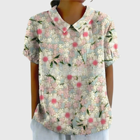Kurzärmelige Damenbluse mit Blumenmuster und Bubikragen in Weiß 2