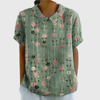 Kurzärmelige Damenbluse mit Blumenmuster und Bubikragen in Salbeigrün