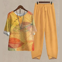 Lisanne | Damen Zweiteiler Set Schmetterlingsprint Hose in Orange