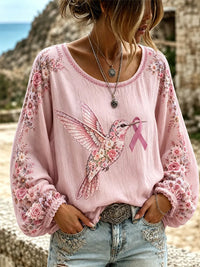 Damen-Longsleeve in Lila mit Blumen- und Kolibri-Print zur Sensibilisierung für die Alzheimer-Krankheit in Rosa