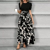 Aria | Damen Maxi-Kleid Puffärmel Blumendruck Bindegürtel in Abstrakt Schwarz