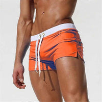 Schnelltrocknende Badeshorts Herren kurz mit Kordelzug in Orange